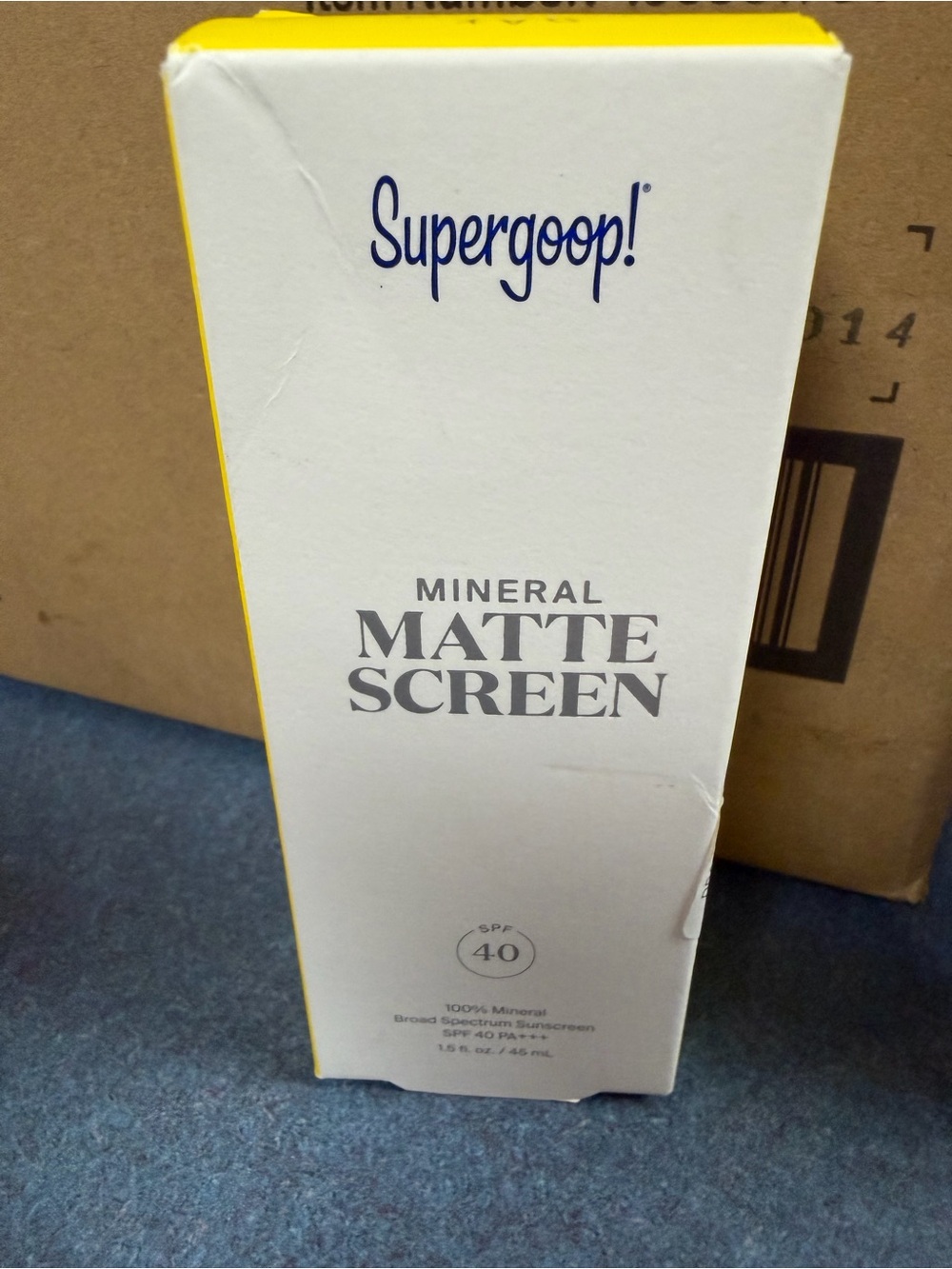 Supergoop! White and Yellow Sunscreen Box